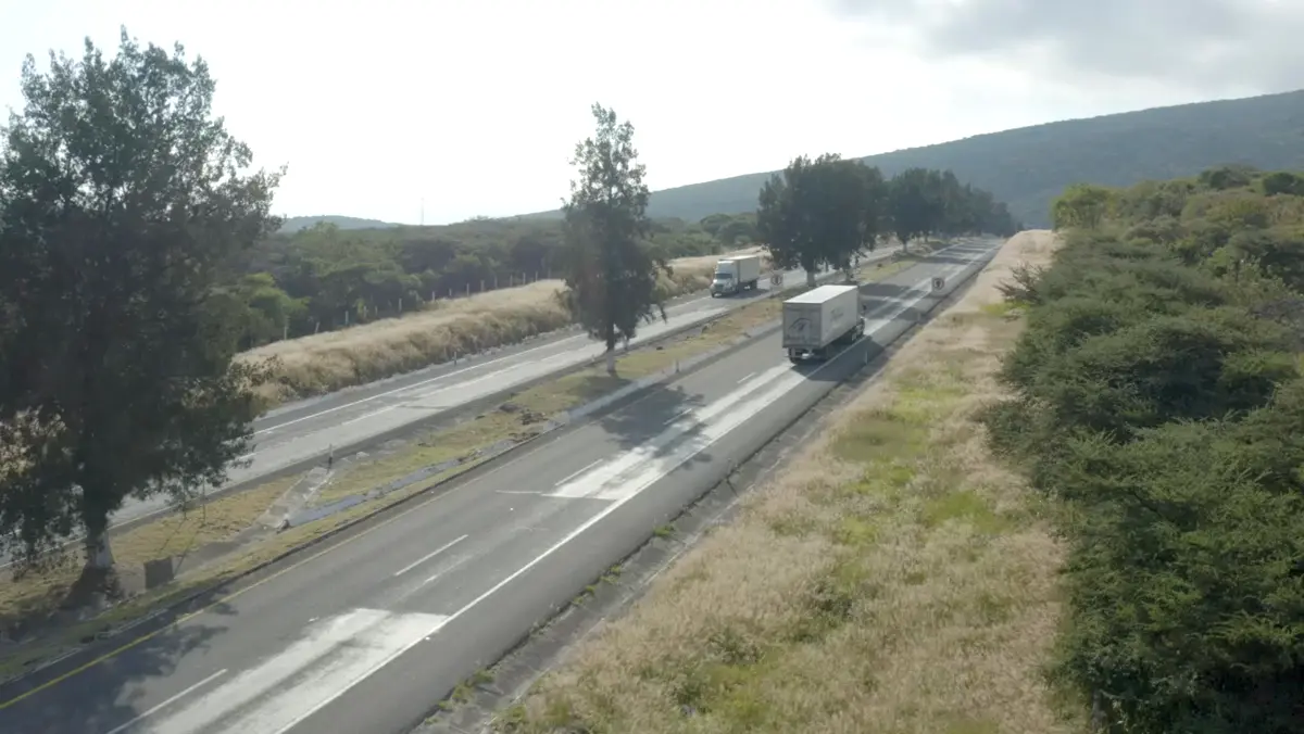 Tractor-trailers on a highway
